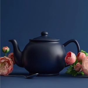 Charming Price & Kensington teapot. Fine stoneware with matte glaze.